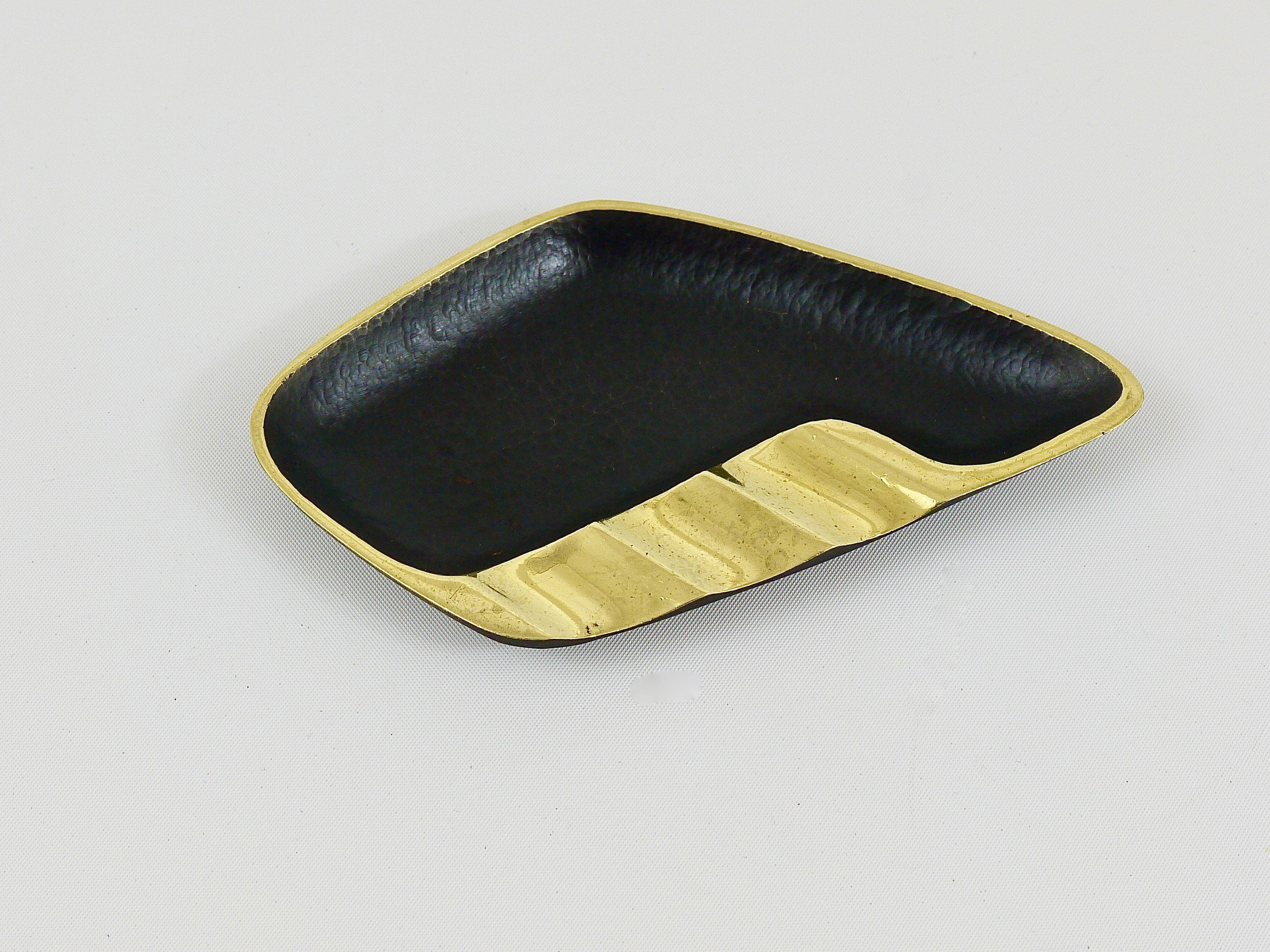 Asymmetrical modernist ashtray by Walter Bosse in black brass by Herta Baller, 1950s.