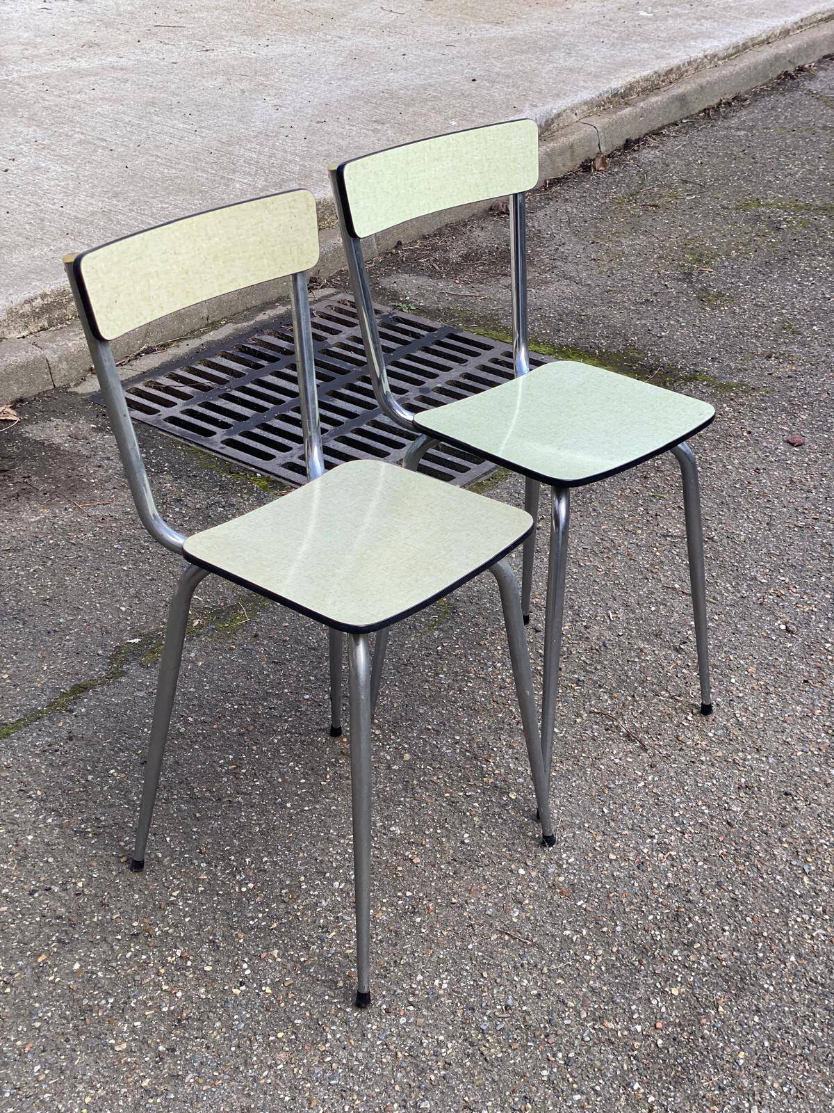 2 light green Formica and steel chairs from the 1980s.