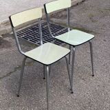 2 light green Formica and steel chairs from the 1980s.