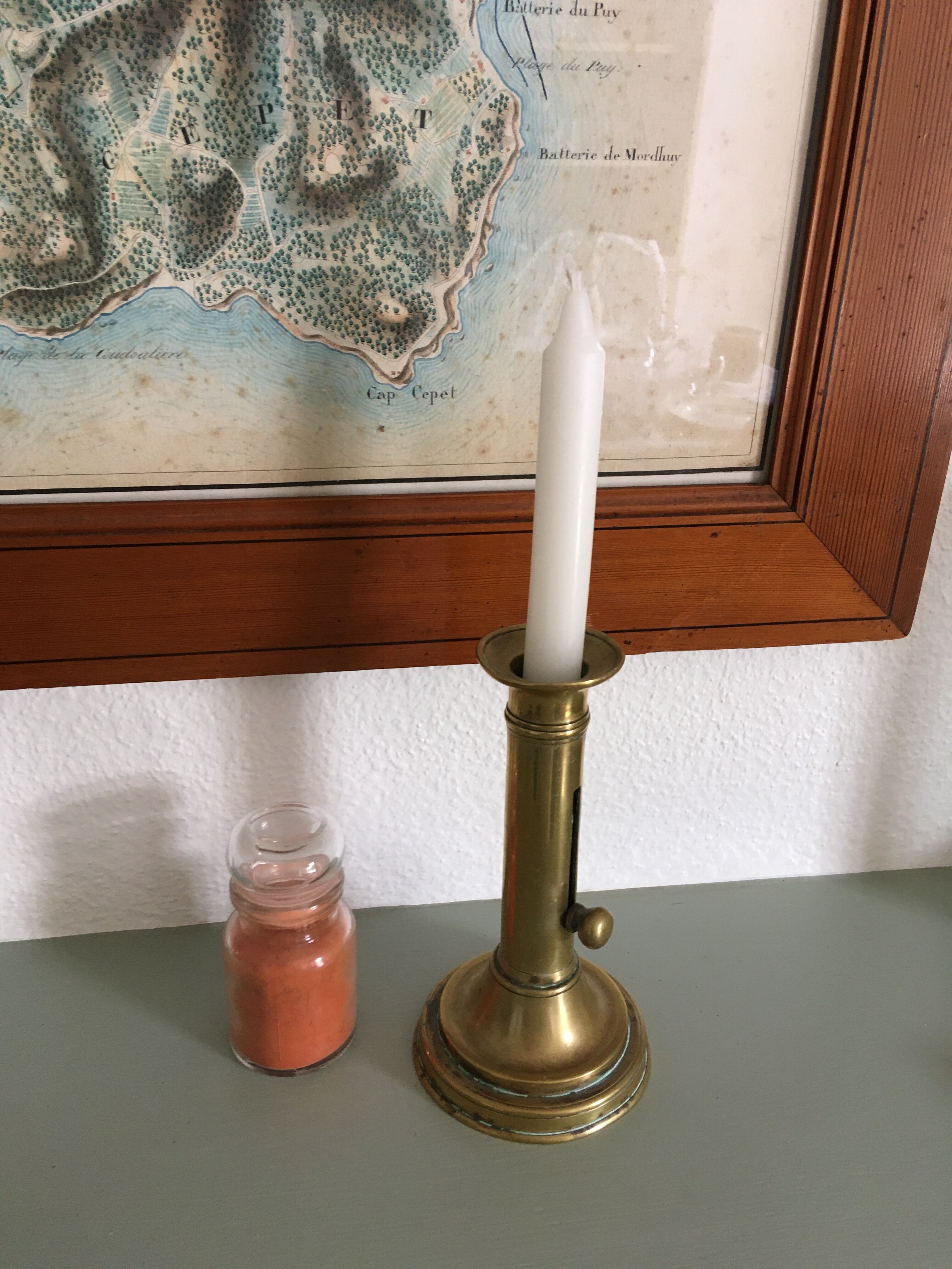 Brass pusher candle holder