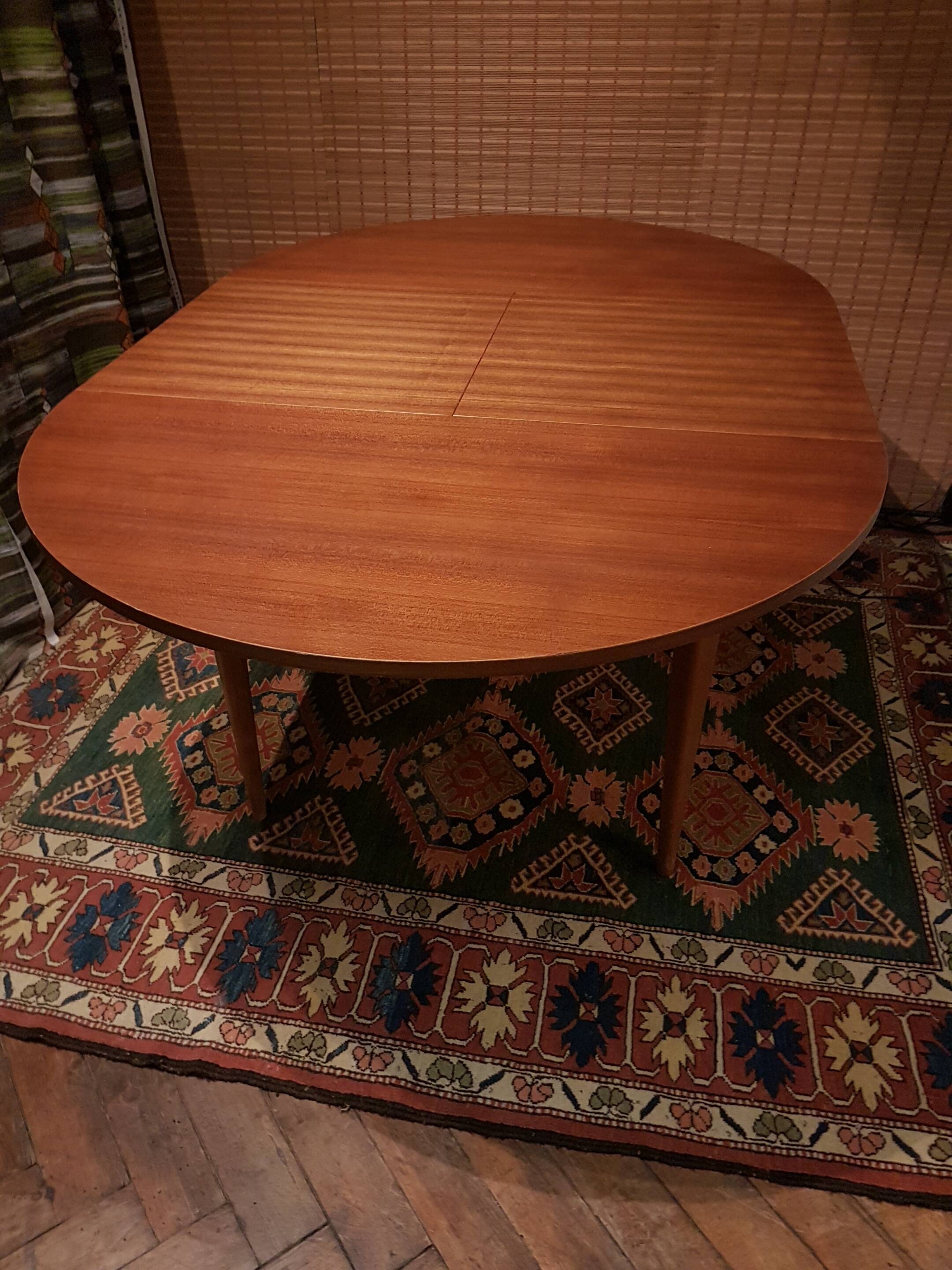 Scandinavian round extending table.