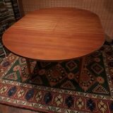 Scandinavian round extending table.