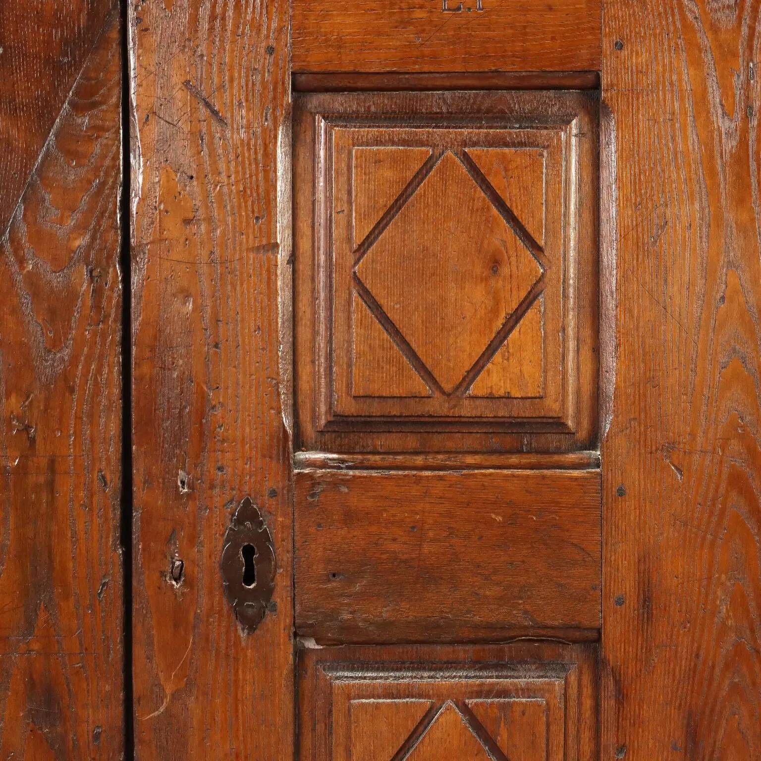 Chestnut buffet with bi-partite panel doors