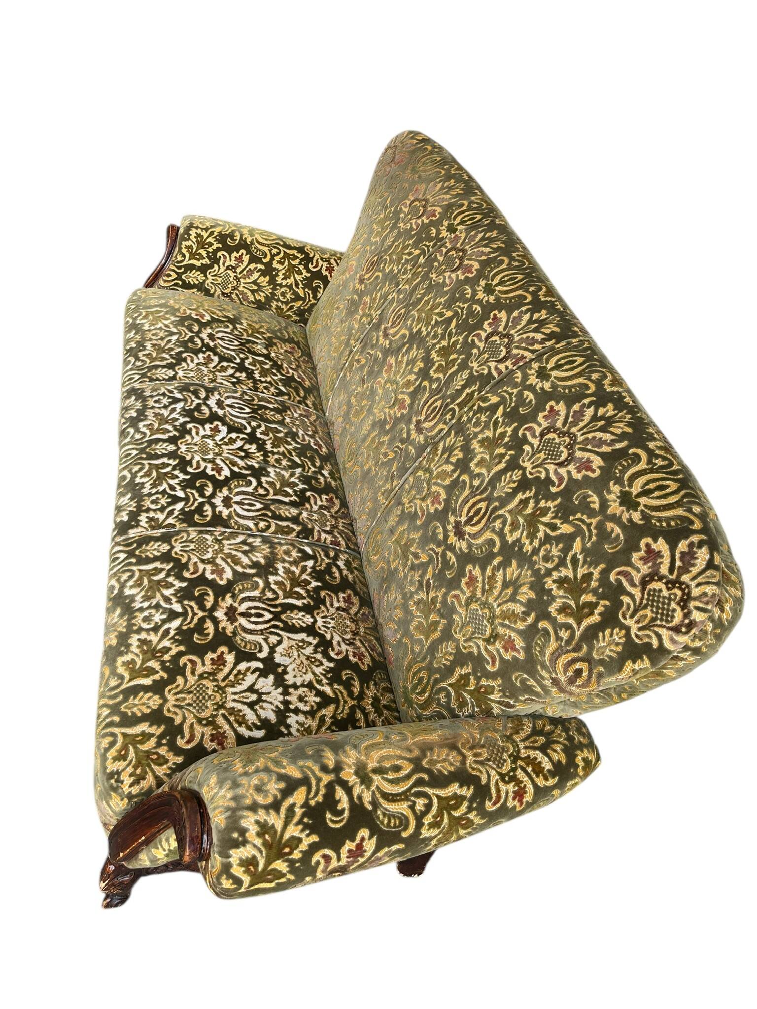 Vintage baroque chair with a rich floral pattern