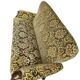 Vintage baroque chair with a rich floral pattern
