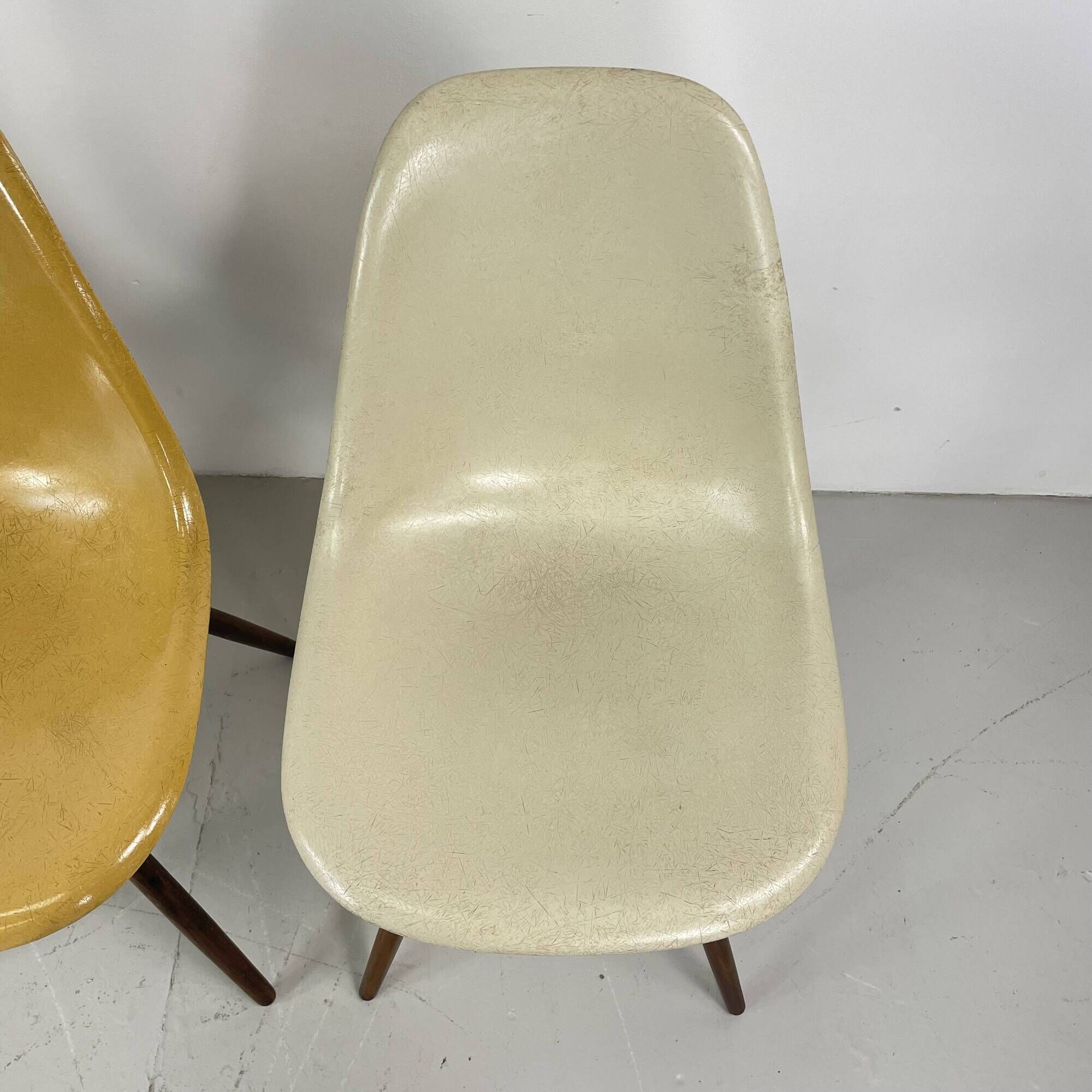 Eames Herman Miller DSW side chairs in greige, seafoam green, light ochre and parchment with slight