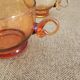 Set of four vintage amber glass cups