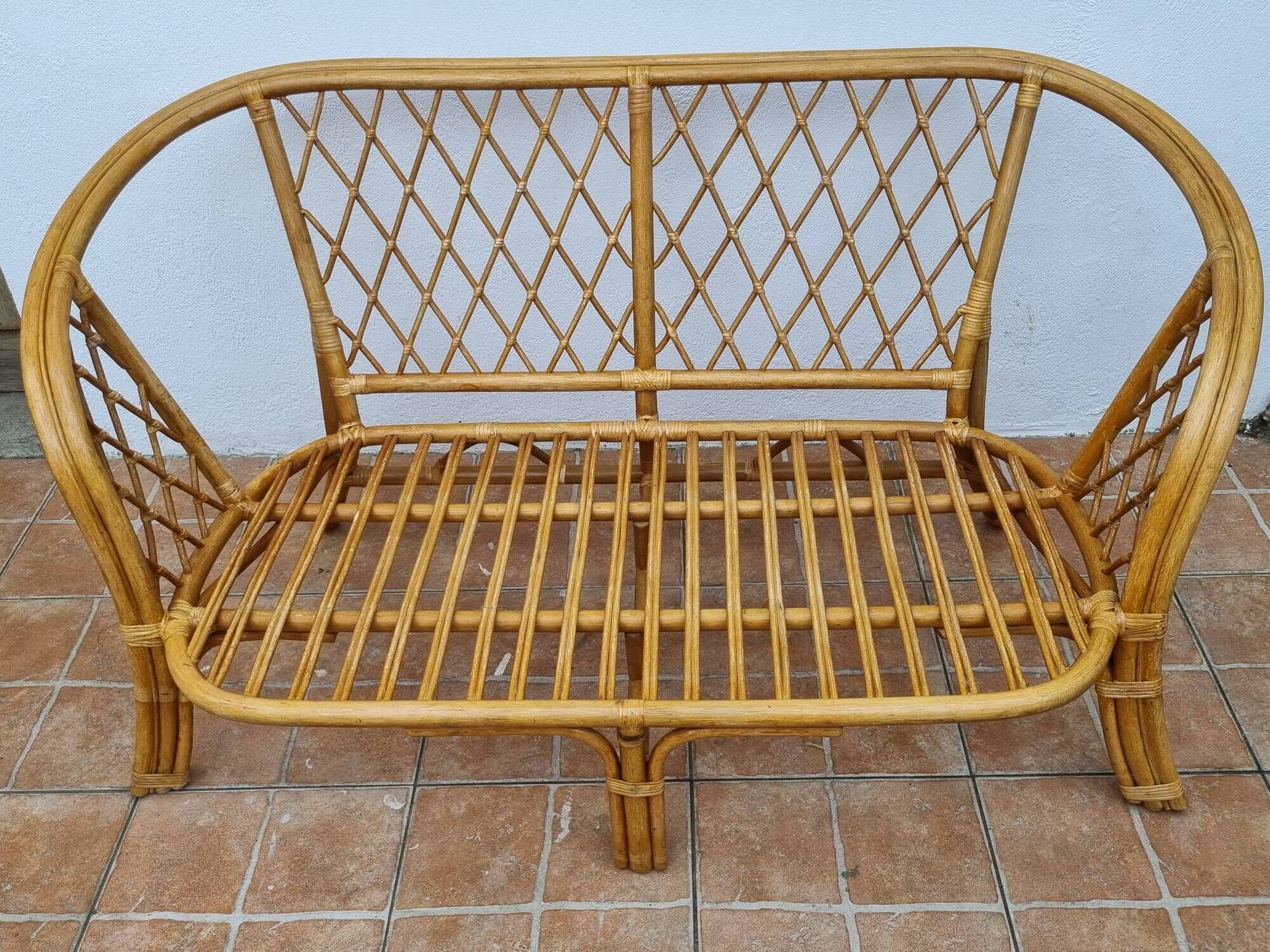 Vintage two-seater natural rattan sofa with cotton cushions, 140 cm