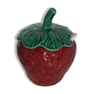 Slurry strawberry jam jar