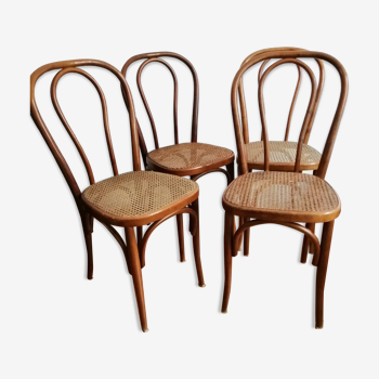 Series of 4 cane bistro chairs
