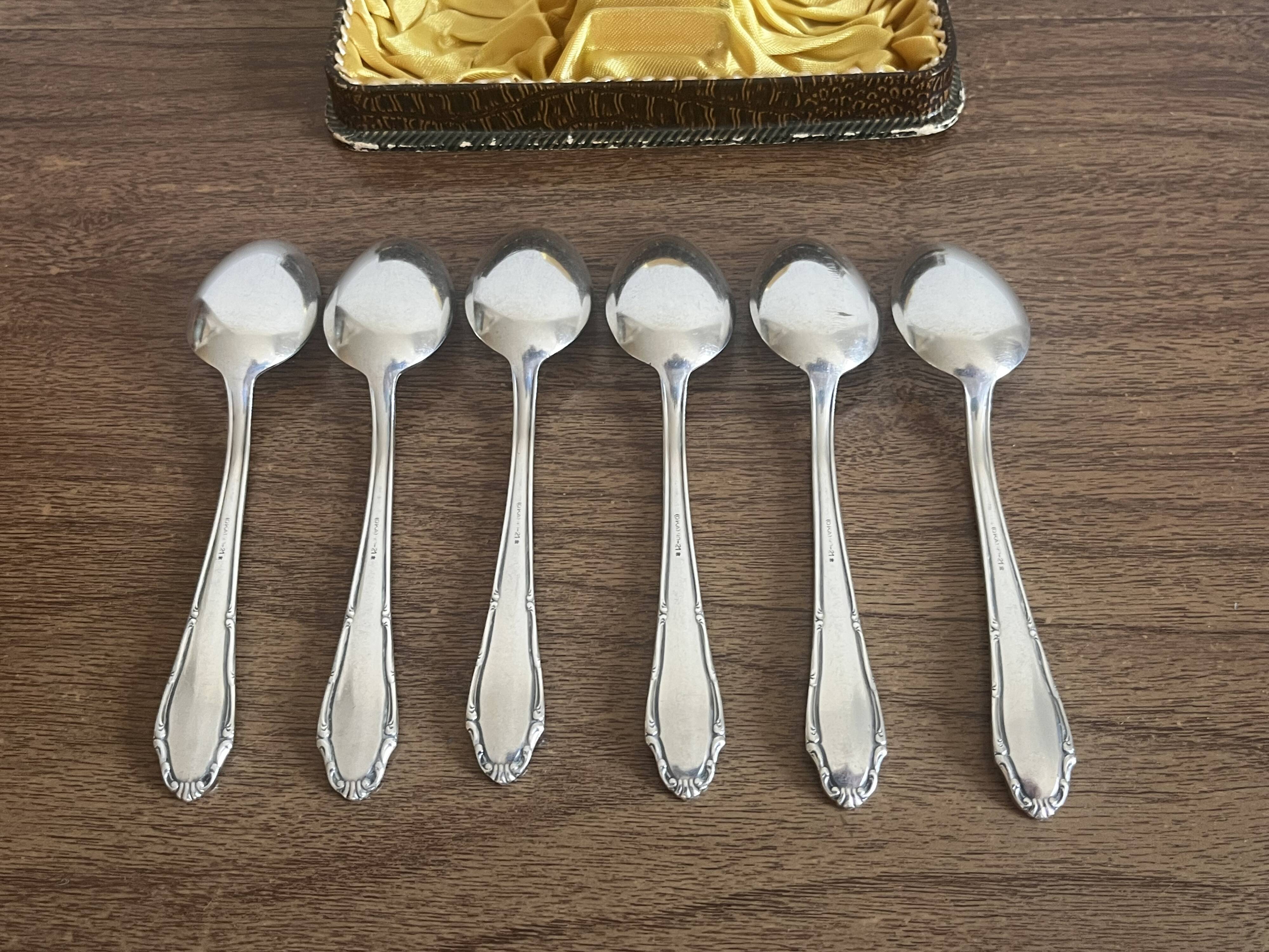 Small silver-plated metal spoons