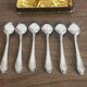 Small silver-plated metal spoons