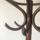 Old curved wooden parrot coat holders