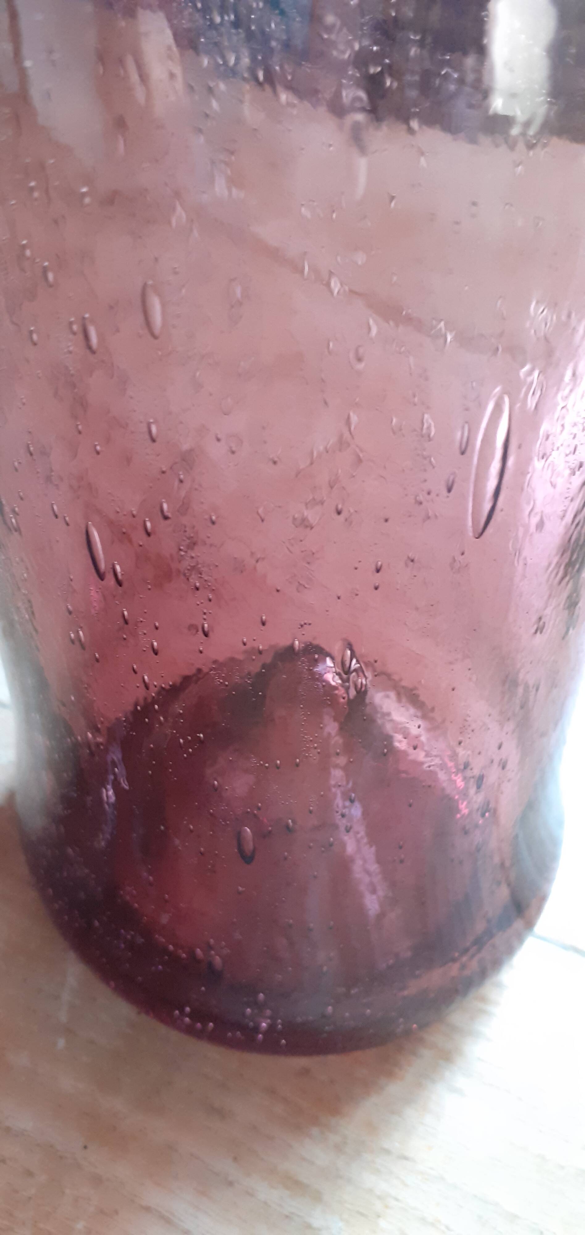 Old long Biot glass bottle