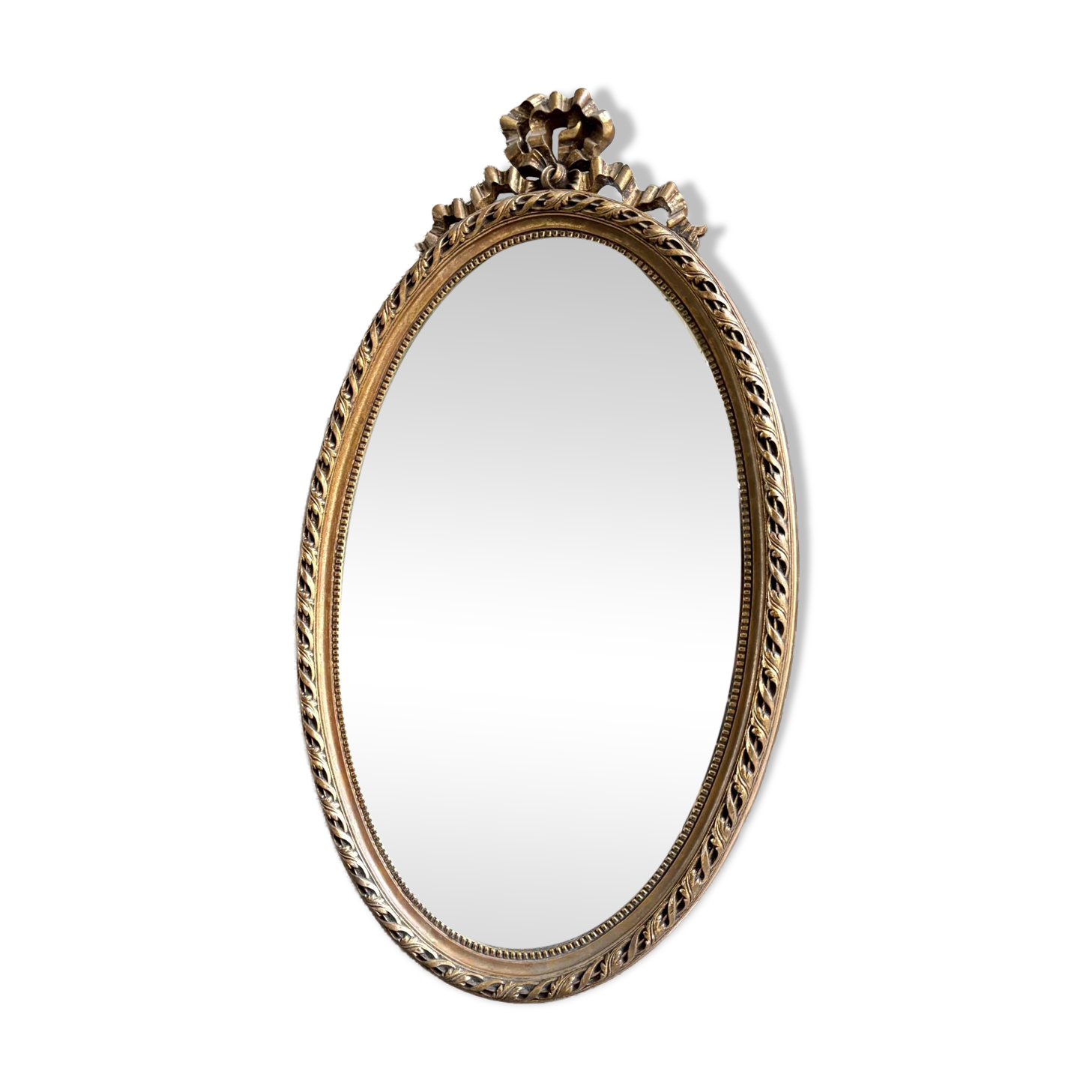 Miroir ovale classique doré à décor de noeud