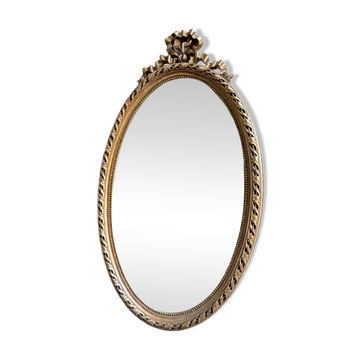 Miroir ovale classique doré à décor de noeud