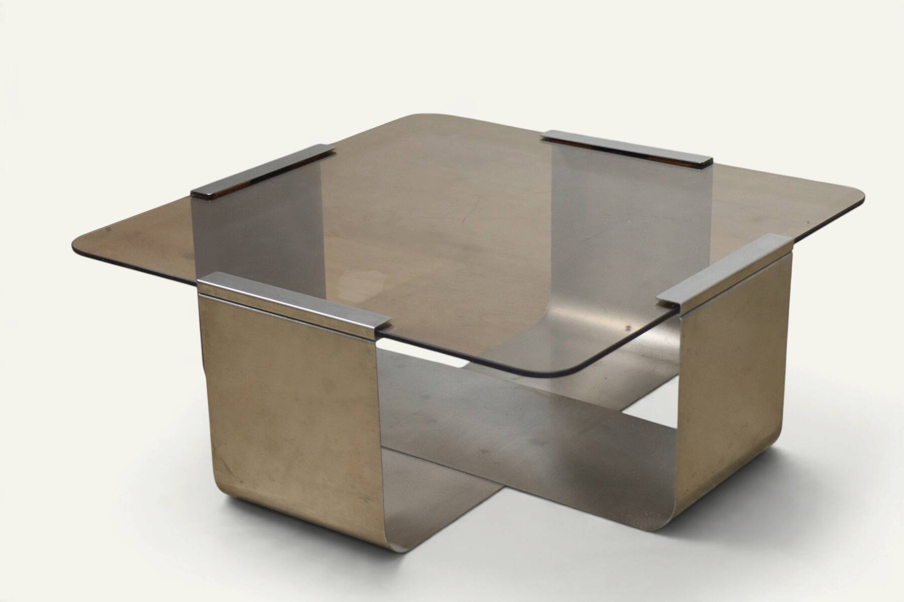 Brushed steel and smoked glass coffee table, by François Monnet – 1970s