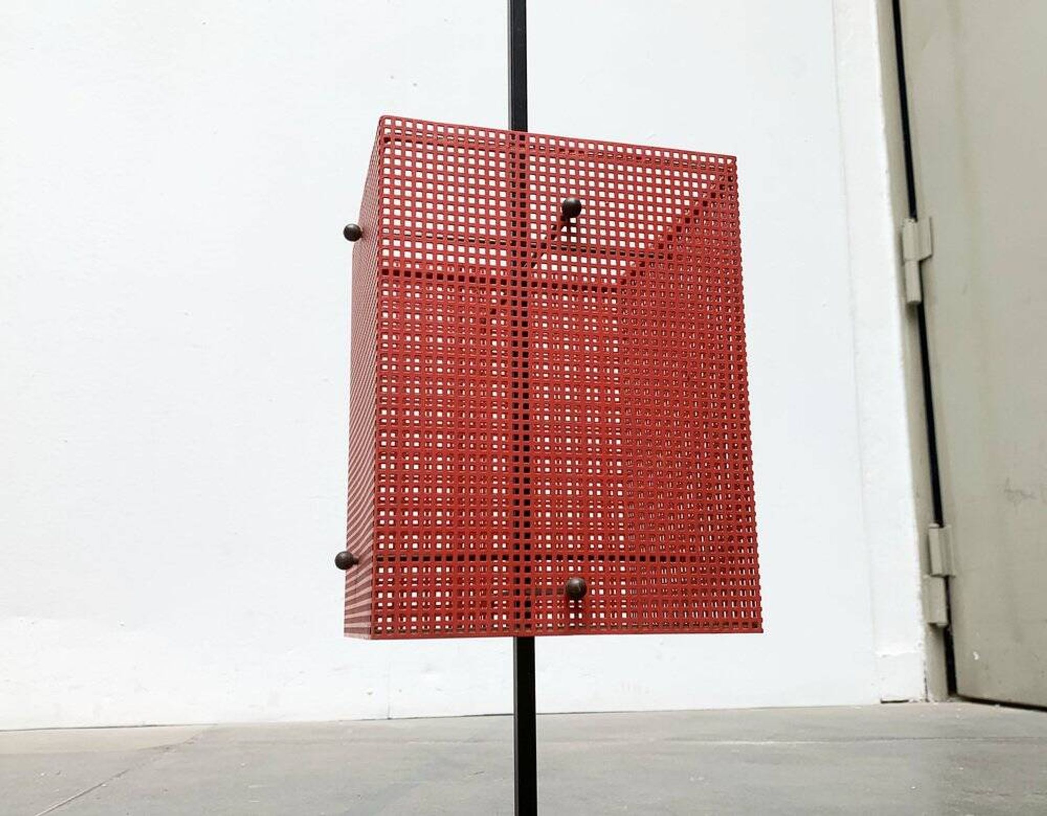 Minimalist perforated steel umbrella stand, 1960s
