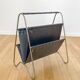 Vintage brass and black leather magazine holder