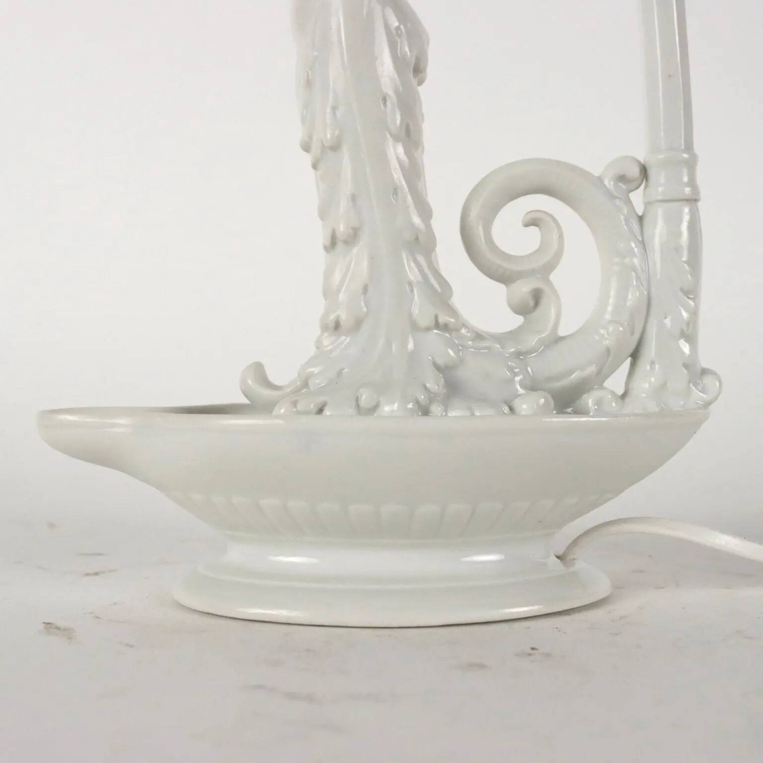 Pair of neoclassical style lamps in porcelain, Italy, 20th century