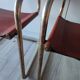 B34 armchairs, cognac leather and gilding