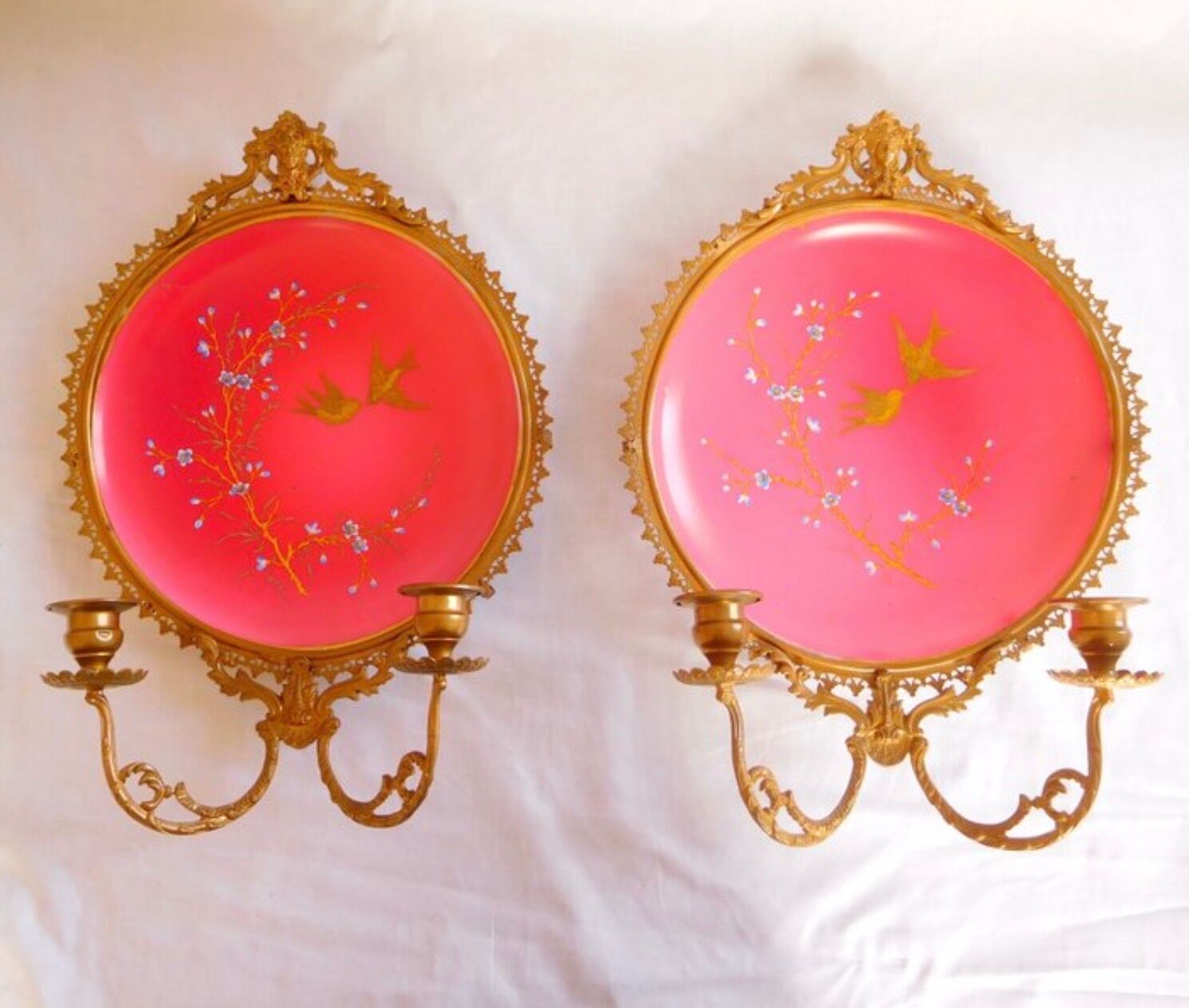 Pair of Napoleon III porcelain and bronze wall lights