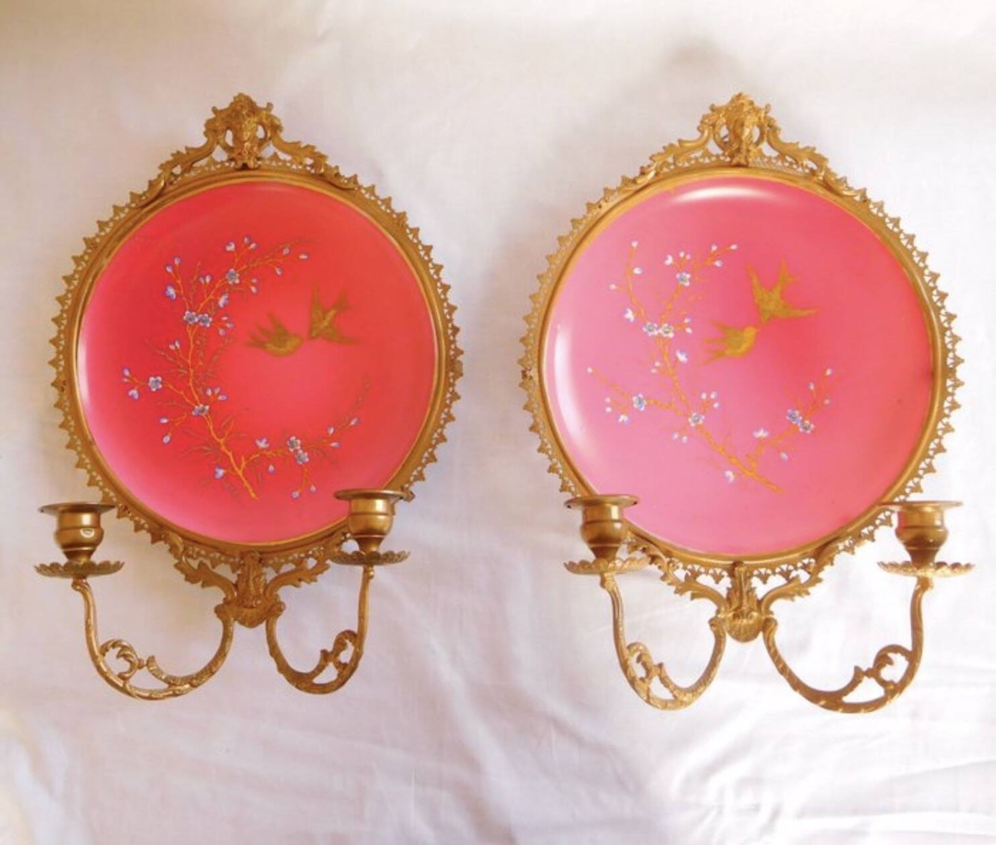 Pair of Napoleon III porcelain and bronze wall lights