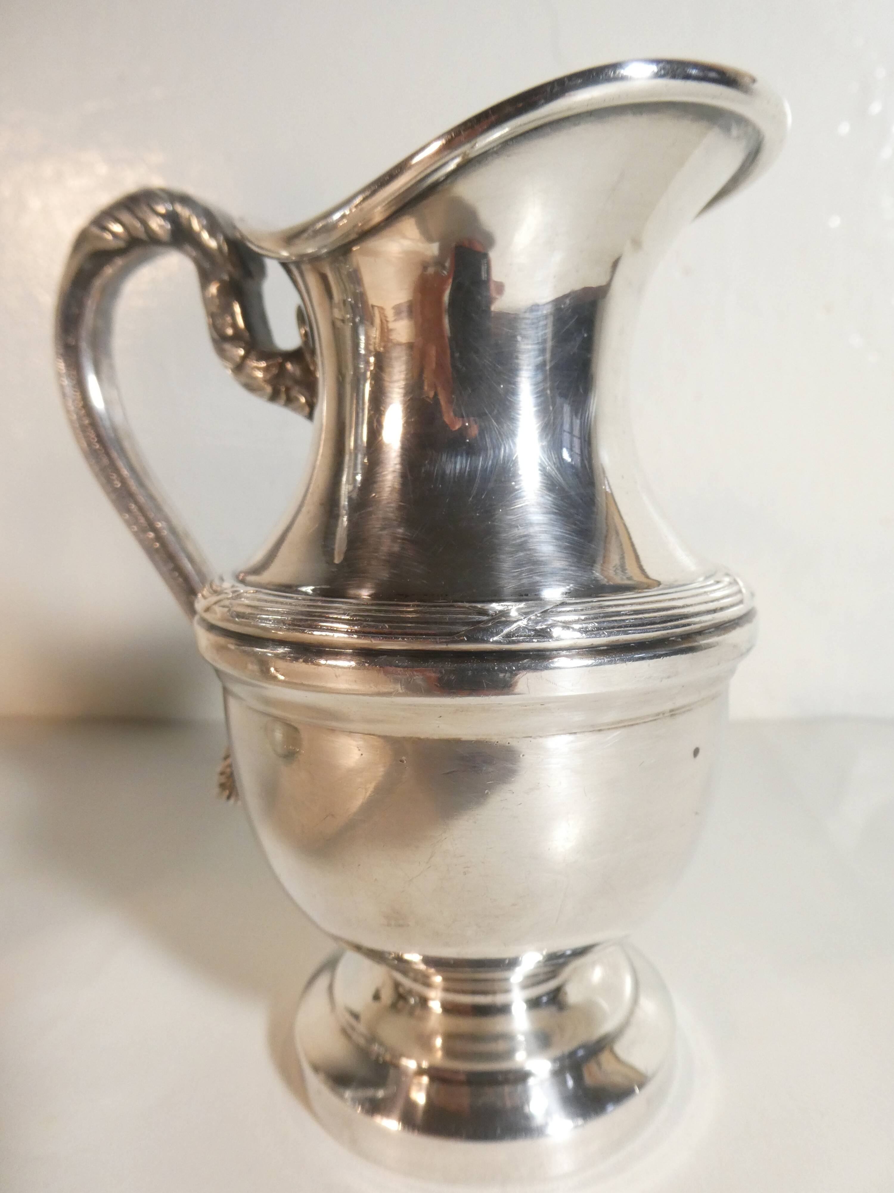 Louis XVI style silver-plated teapot and milk jug