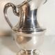 Louis XVI style silver-plated teapot and milk jug