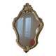 Small violin mirror in gilded resin