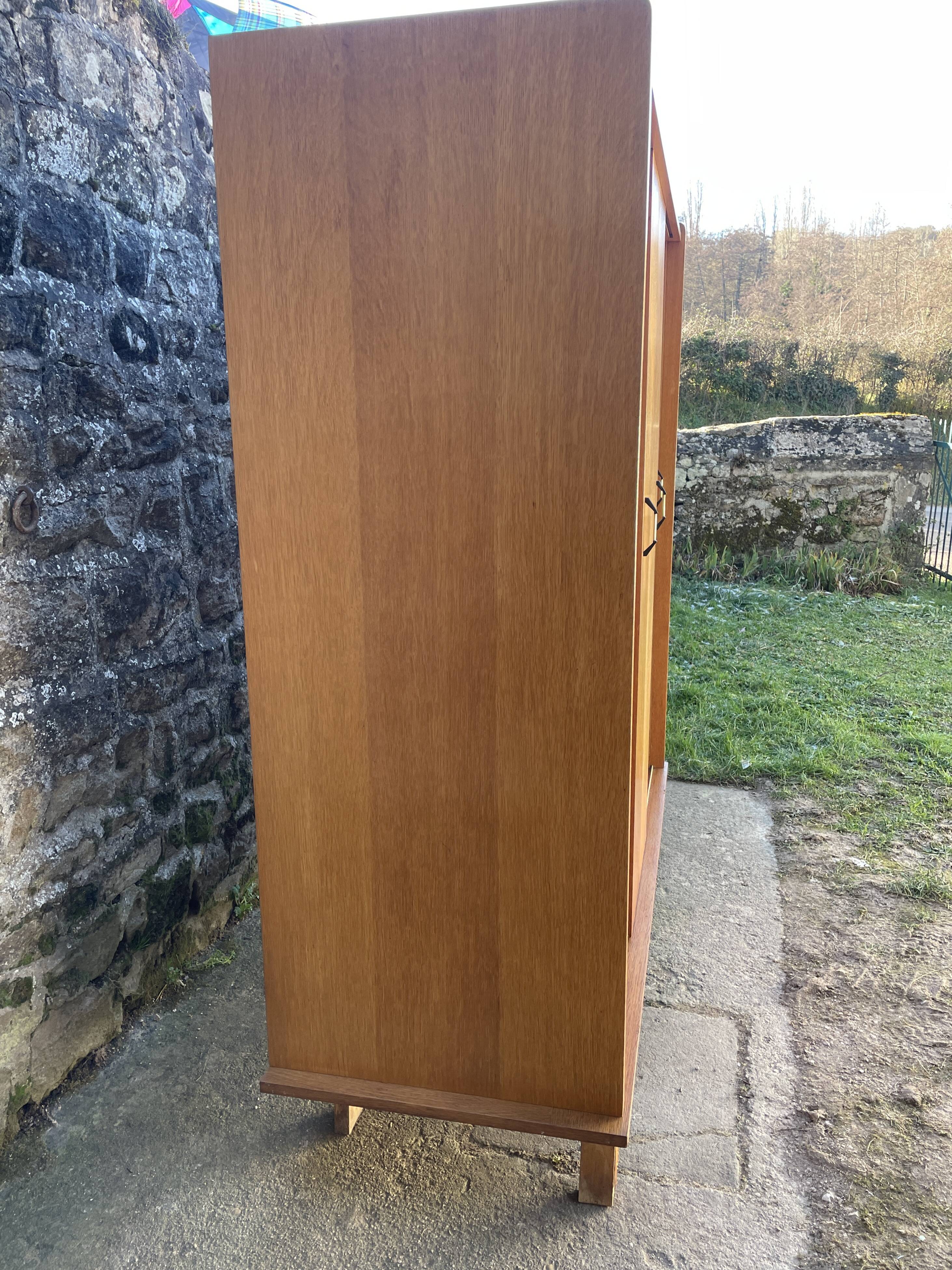 Light oak sliding door wardrobe, 1960