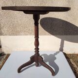 Small rustic antique tripod side table made of solid wood.