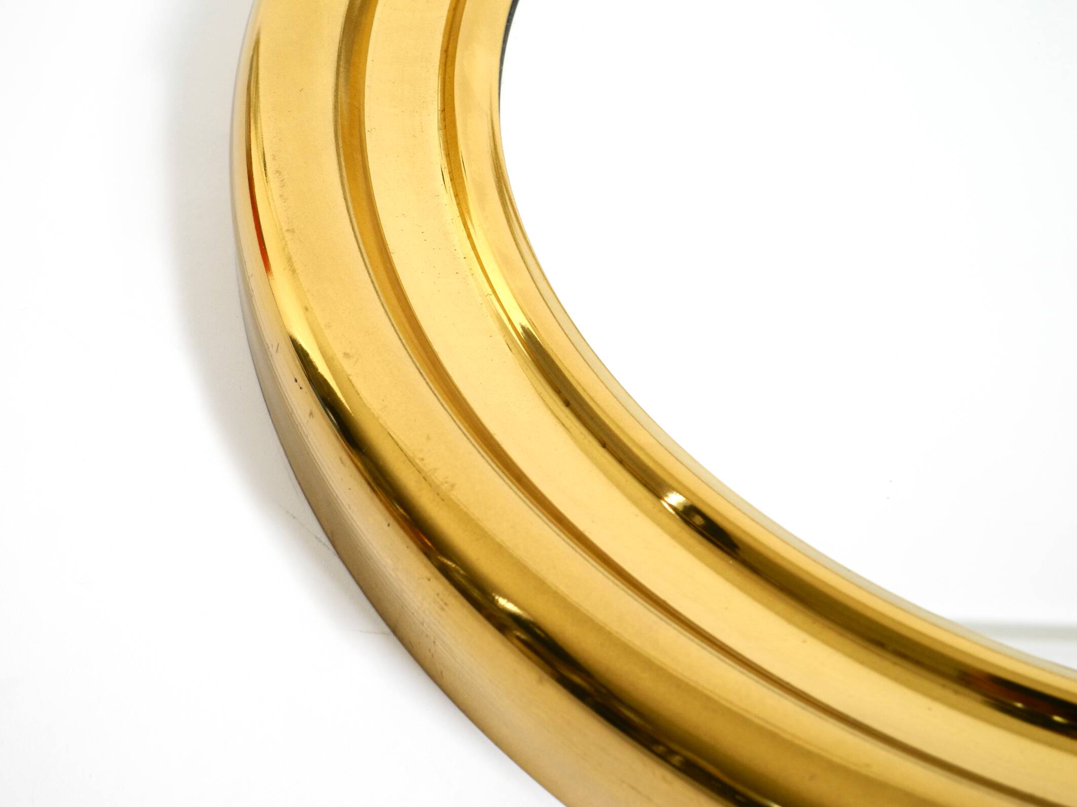 Beautiful, heavy, round Italian brass mirror from the 1960s