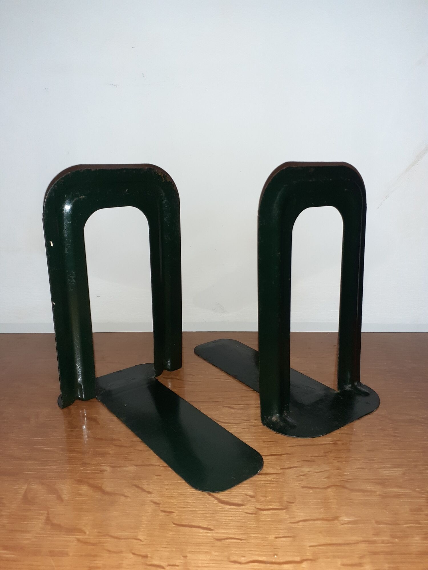 Pair of Ravel Clamart book clamp backs industrial sheet metal