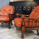 Pair of 60s armchairs in leather and wood