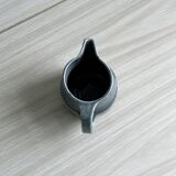 Blue and beige ceramic milk jug