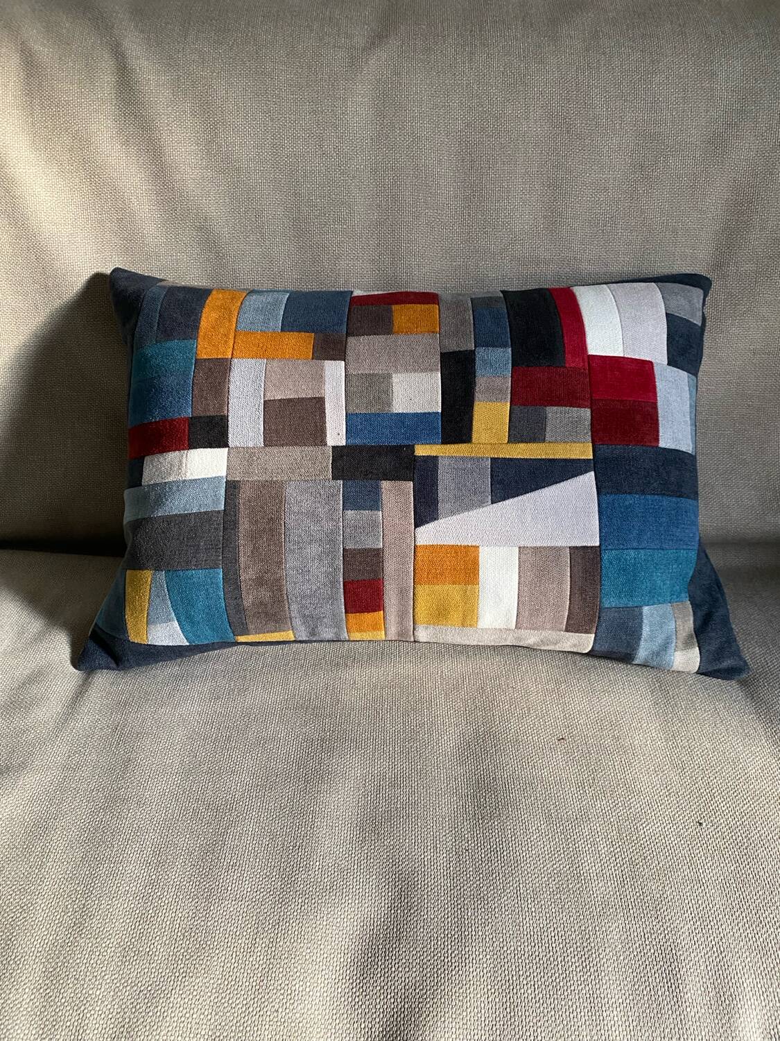 Patchwork cushions made from upholstery fabric