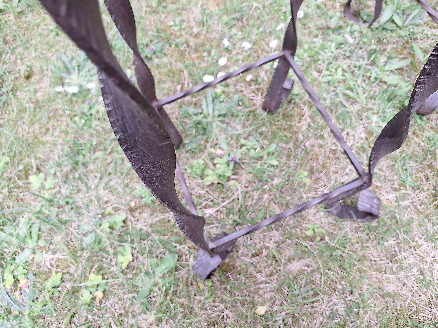 Pair of Brutalist patinated iron and veined marble columns, 1960s