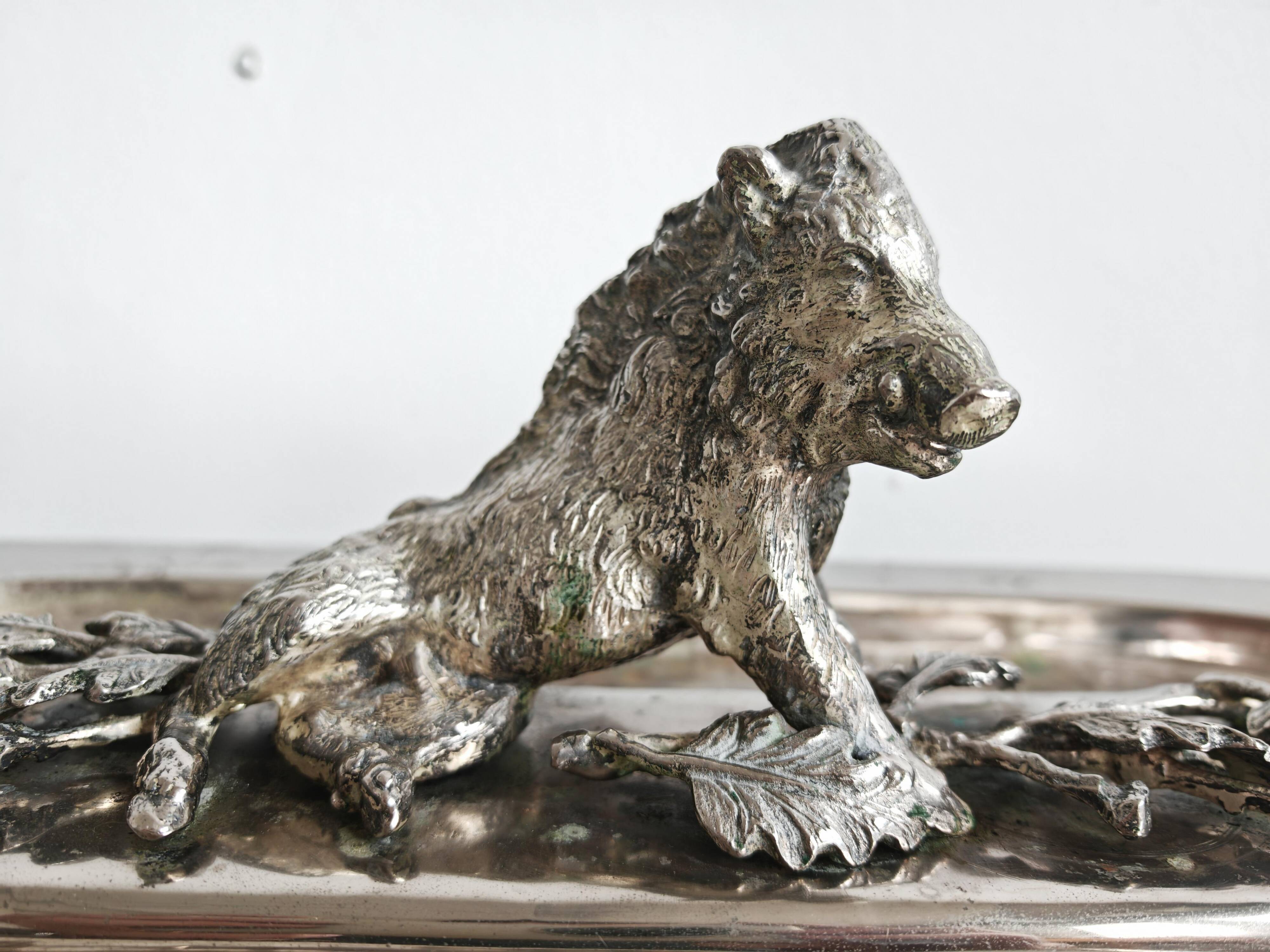 Silver serving dish by Franco Lapini with boar sculpture.