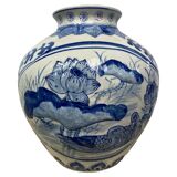 Chinese vase in blue-white porcelain decorated with lotus flowers