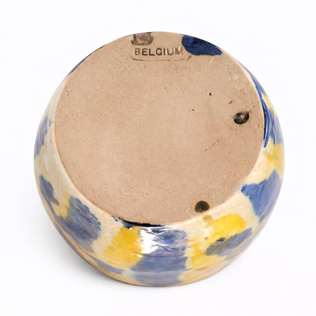Baluster vase in Belgian ceramic with flowing blue and yellow glazes.