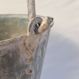 Old bucket with thick zinc handle