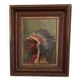 Old oil painting on panel of a Native American chief from the 19th century Wild West.