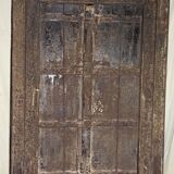 Old wooden door with frame