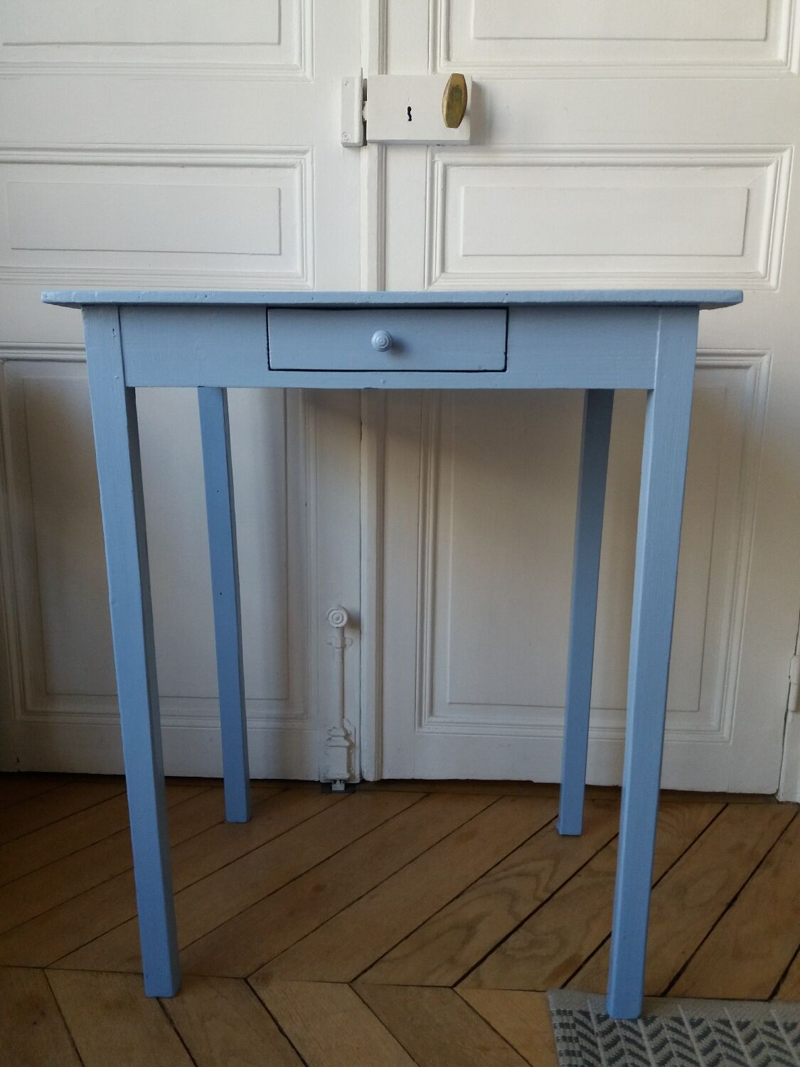 Lavender blue wooden desk with drawers