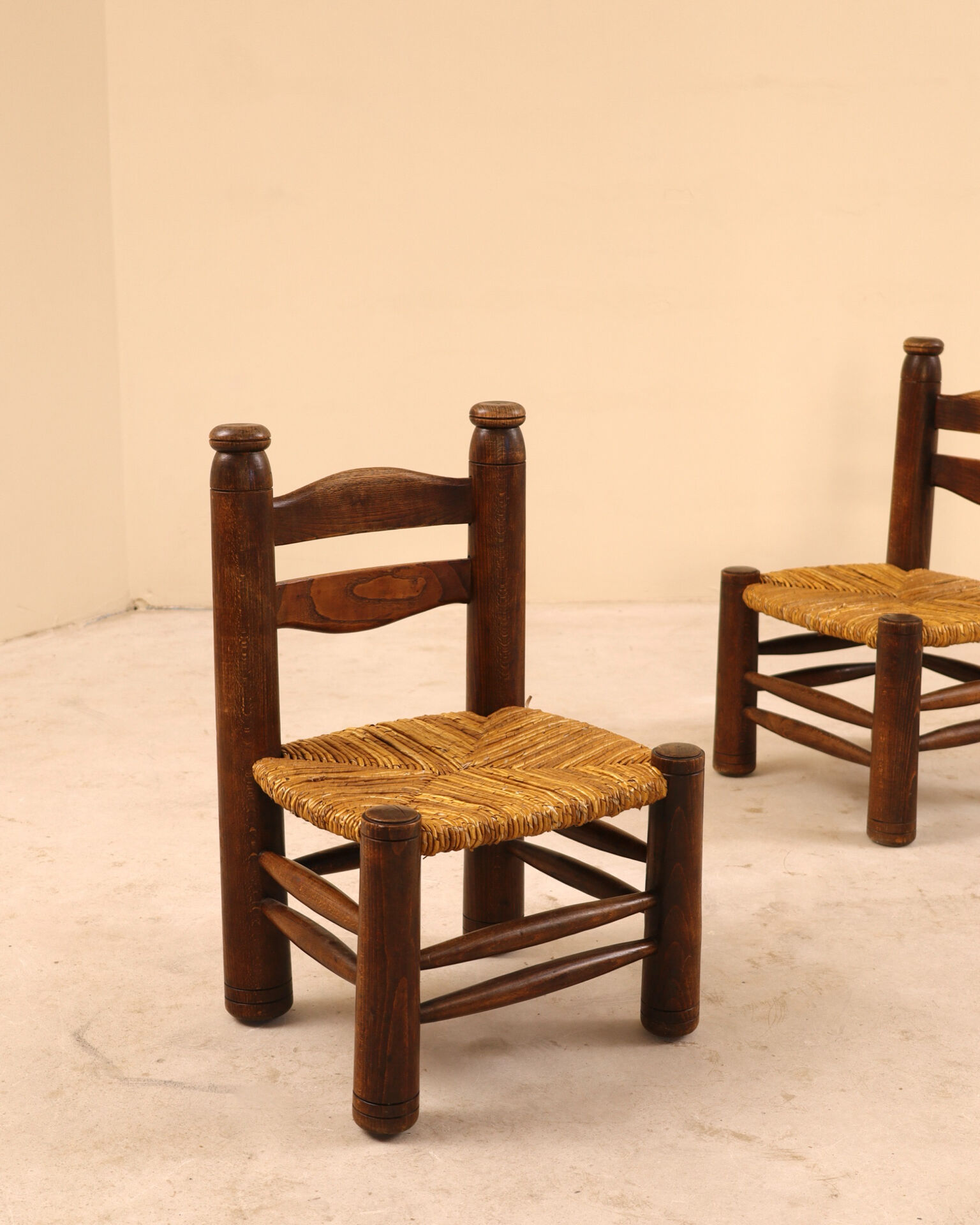 Low fireplace chair attributed to Charles Dudouyt.