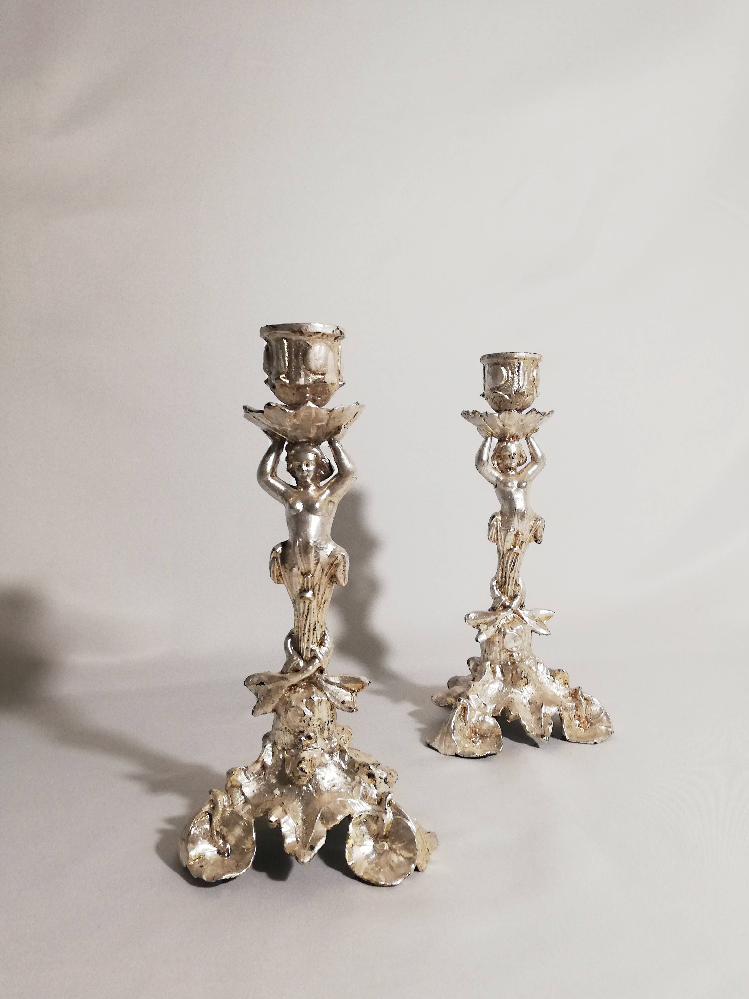 Pair of candlesticks restored to silver leaf