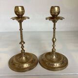 Pair of brass candlesticks with worked flower balls.