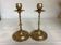 Pair of brass candlesticks with worked flower balls.