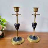 Pair of brass and black hard stone candlesticks